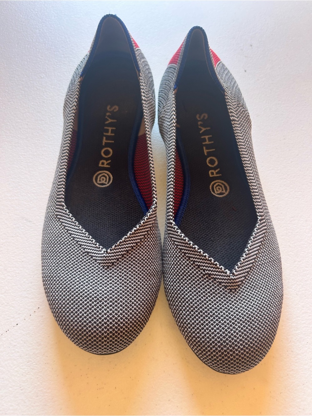 Rothy's Black & White Knit Pointed-Toe Flats with Red Accent